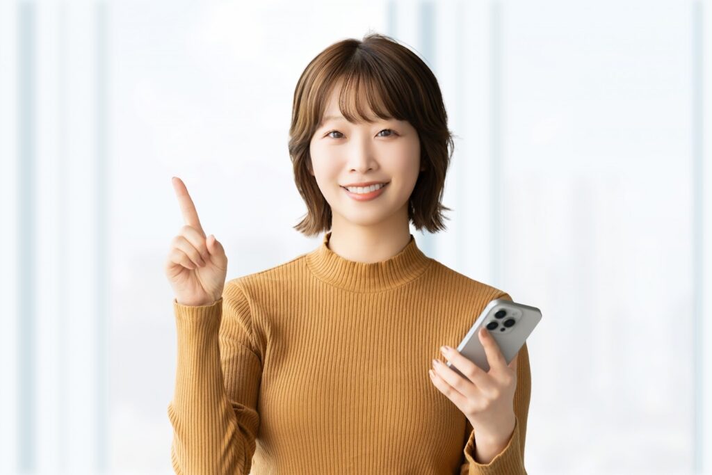 スマホを持つ女性